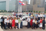 City of Dallas Code Compliance group photo in front of the City Hall Plaza